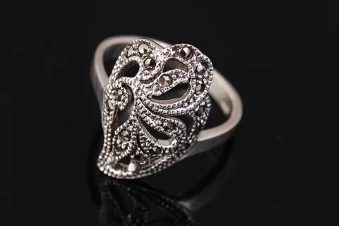 Silver ring on black background Stock Photos