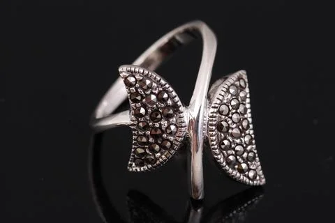 Silver ring on black background Stock Photos