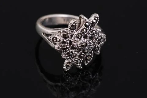 Silver ring on black background Stock Photos