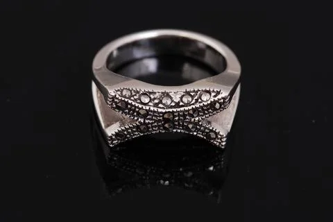 Silver ring on black background Stock Photos