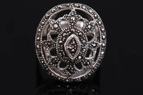 Silver ring on black background Stock Photos