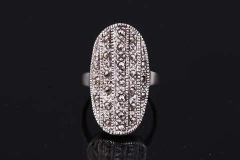 Silver ring on black background Stock Photos