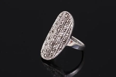 Silver ring on black background Stock Photos