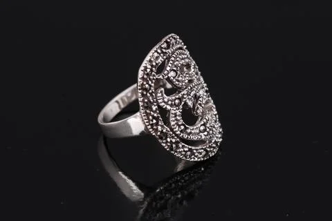 Silver ring on black background Stock Photos