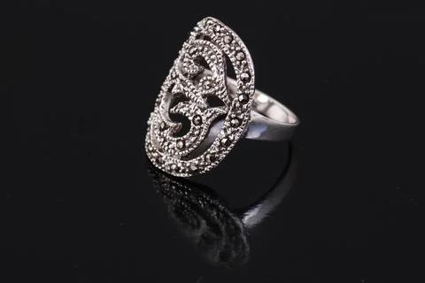 Silver ring on black background Stock Photos