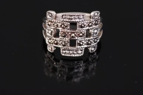 Silver ring on black background Stock Photos