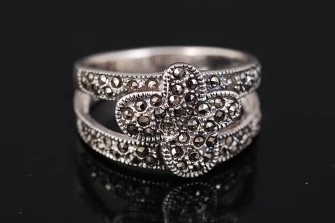 Silver ring on black background Stock Photos