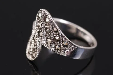 Silver ring on black background Stock Photos