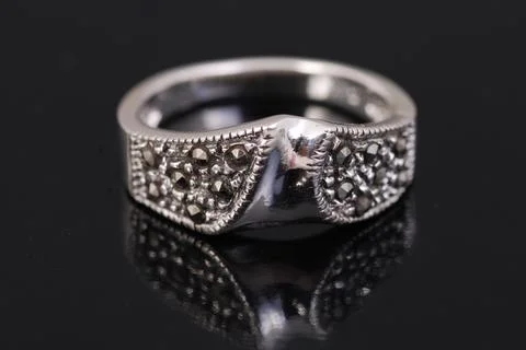 Silver ring on black background Foto stock