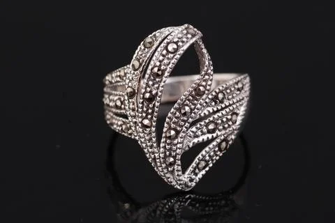 Silver ring on black background Stock Photos