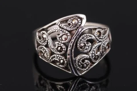 Silver ring on black background Stock Photos