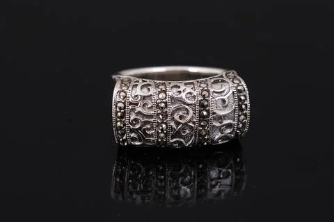 Silver ring on black background Stock Photos