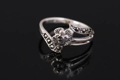 Silver ring on black background Stock Photos