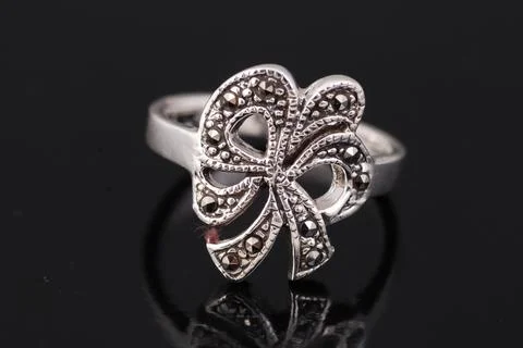 Silver ring on black background Stock Photos