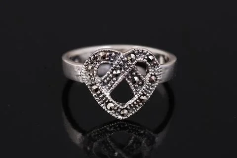 Silver ring on black background Stock Photos