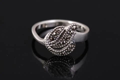 Silver ring on black background Stock Photos