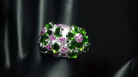 Silver ring with chrome diopside ruby on the hand Stock Footage 146317680