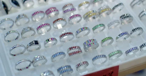Silver ring decorated with multi-colored diamonds.Silver ring decorations. Stock Footage 304087213