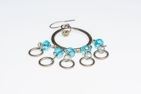 Silver ring earring with blue beads Stock Photos