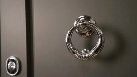 Silver Ring Handle on a Gray Cabinet Door Stock Footage 331710073