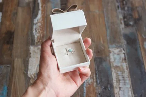 Silver ring in the present box, blurred background Stock-Fotos