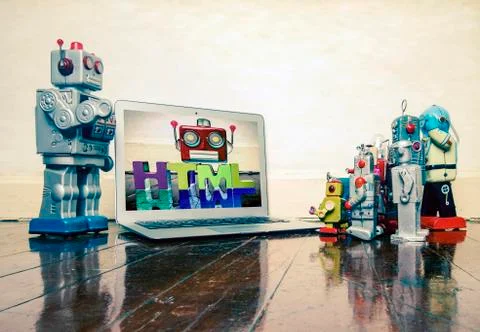 Silver robot teaching about code Stock Photos