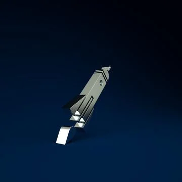 Silver Rocket ship with fire icon isolated on blue background. Space travel.  Stock Illustration