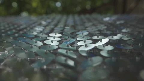 Silver round metal sequins in the decoration of the decoration, close-up. Stock Footage 158812387
