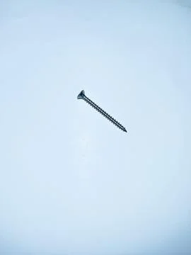 Silver screw on a white background Stock Photos