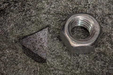 Silver screws with thread magnifyed 库存照片