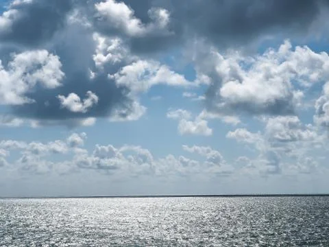 Silver sea black clouds. Photos