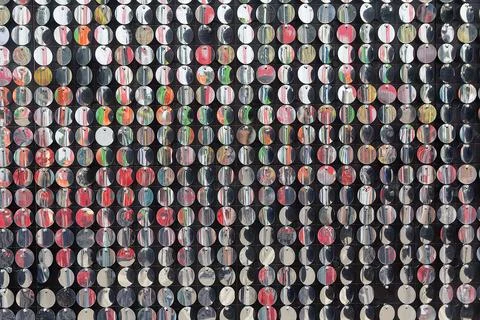 Silver sequin wall with sparkling reflections. festive 库存照片