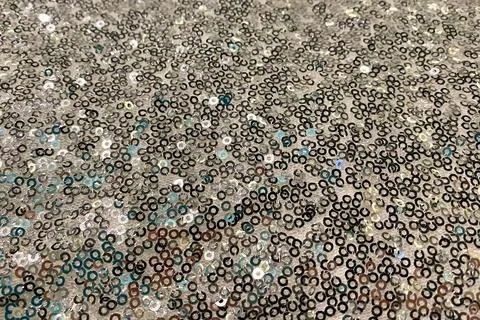 Silver sequins as a background, close-up. High quality photo Stock Photos