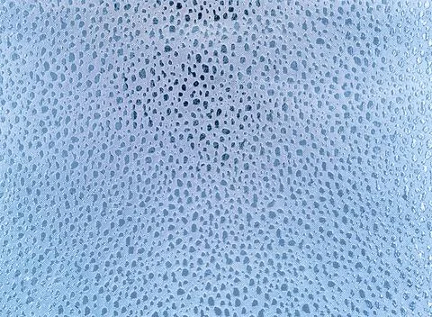 Silver sequins sparkling background. Texture or glitter background. Stock Photos