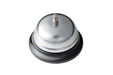 Silver Service Bell on Black Base for Hotel Reception and Concierge Desk Stock Photos