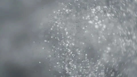 Silver shining glitter particles exploding in slow motion Vídeos de archivo 293100116