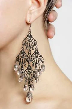Silver shiny earring. Stock-Fotos
