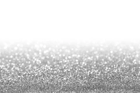 Silver sparkle. Glitter background. Stock Photos