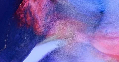 Silver splash on blue-red paint abstract background. Shiny silver flowing wave Stock Photos