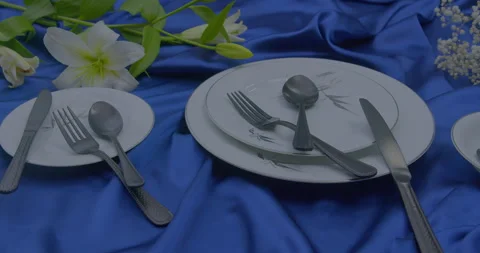 Silver spoon and fork cutlery set on the table Stock Footage 260544228