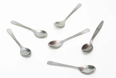 Silver spoon  isolated on white background Stock Photos