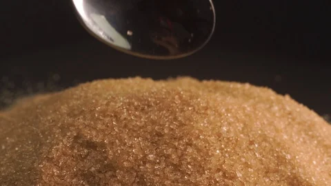 Silver spoon scoops up sugar Stock-Footage 86643576