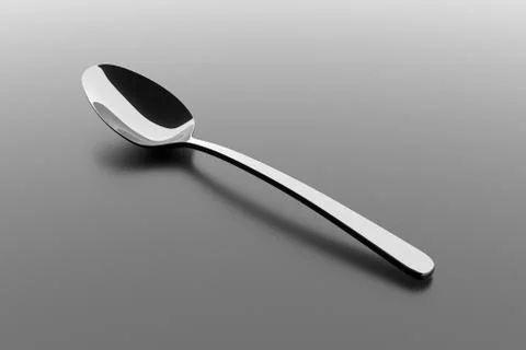 Silver spoon on a table Stock Illustration