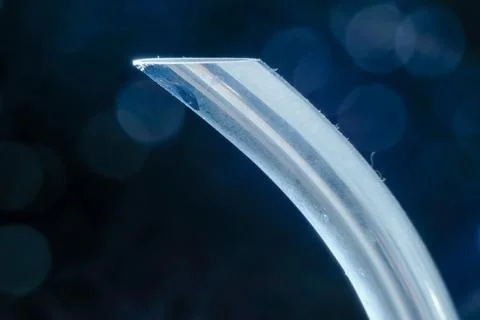 Silver spout in macro view with bokeh in background Stock Photos