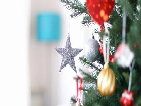 Silver star spinning in christmas tree Stock Footage 73093702