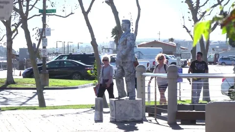 Silver Statue Man in the crowded park Stock Footage 69151818