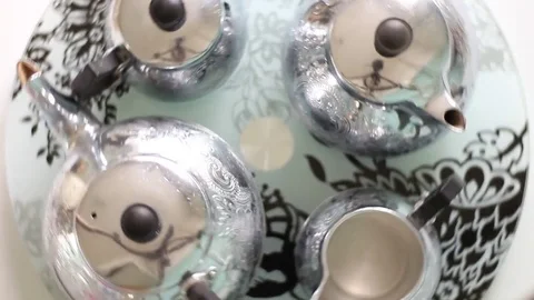 Silver tea service on the rotating tray Vídeo Stock 71954218