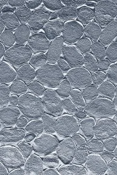 Silver textured background creating a seamless pebble pattern Stock Photos