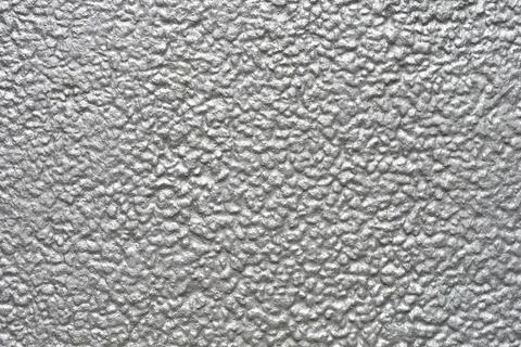 Silver textured metallic wall surface in a horizontal full frame background Stock Photos