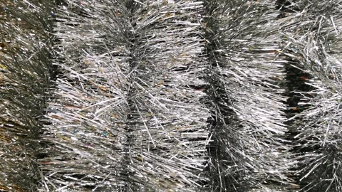 Silver tinsel. Christmas video. Camera movement from top to bottom. Stock Footage 119070100